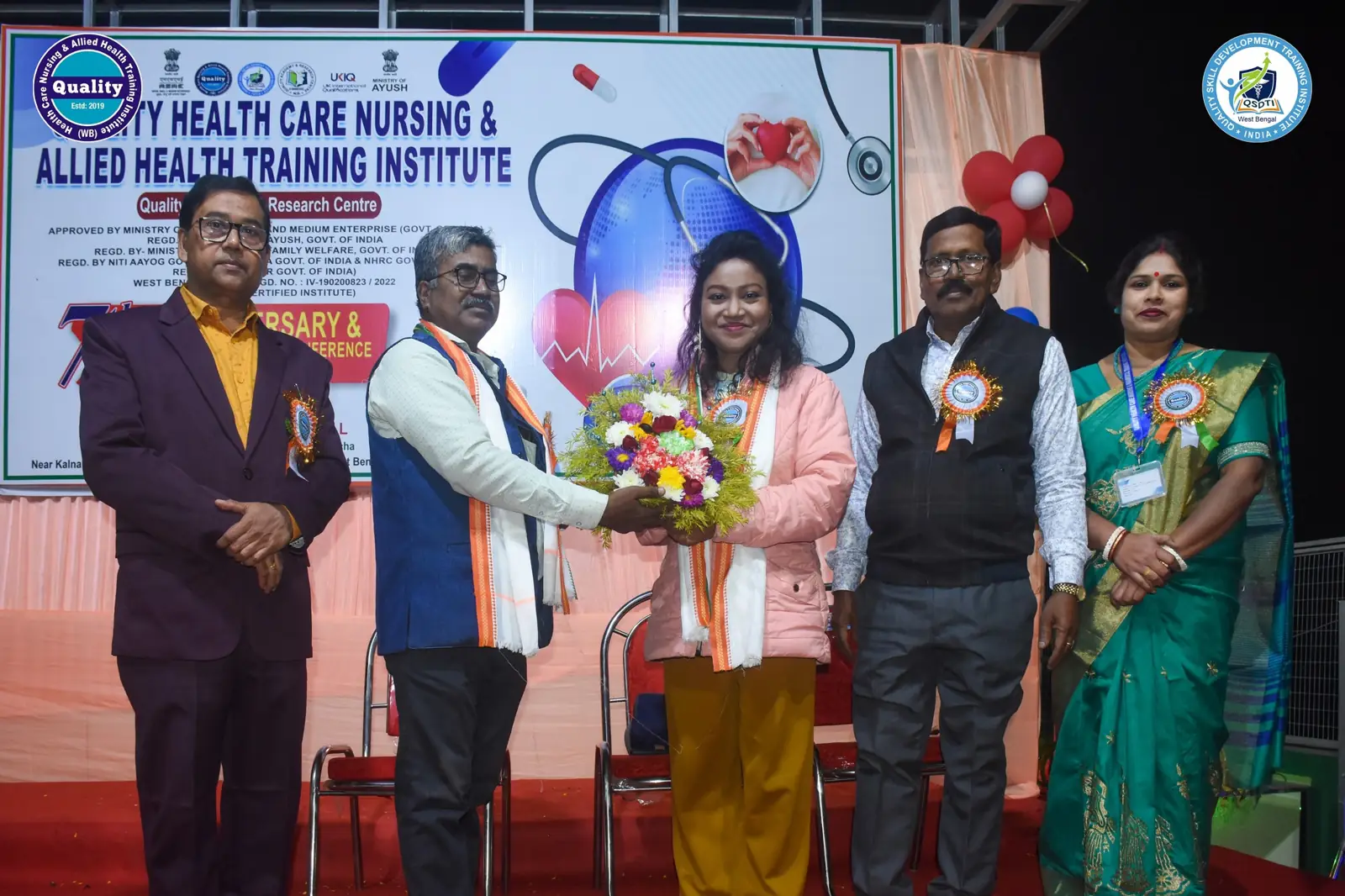 Dr. Mousumi Murmu Dr. Somir Kr roy on stage - 7th Foundation Celebration 2026